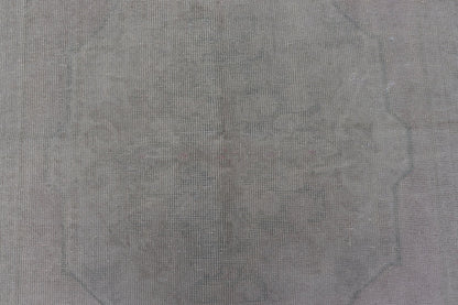 Vintage Turkish Medallion Oushak with All - Over Muted Tones of Neutral Colors Measures 4'5 x 7'0 The taupe - sandy color field homes a muted central medallion decorated in muted blue and pink. Tones of faded light green can be found within... - Keivan Woven ArtsEN - 142089 - 10940Rug