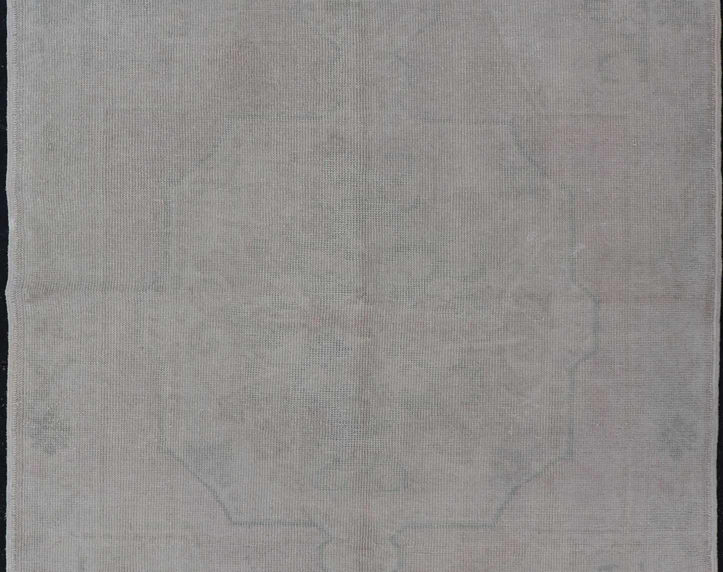 Vintage Turkish Medallion Oushak with All - Over Muted Tones of Neutral Colors Measures 4'5 x 7'0 The taupe - sandy color field homes a muted central medallion decorated in muted blue and pink. Tones of faded light green can be found within... - Keivan Woven ArtsEN - 142089 - 10940Rug