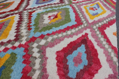 Modern Turkish Angora Tulu Rug with Colorful Diamond Design Measures: 8'6'' X 12'3''. This modern Tulu rug showcases a free - spirited design and stunning colors, such as blue, purple, green, red, yellow, and light blue - grey, all set on an ivor... - Keivan Woven ArtsEN - 142119 - 7841Rug