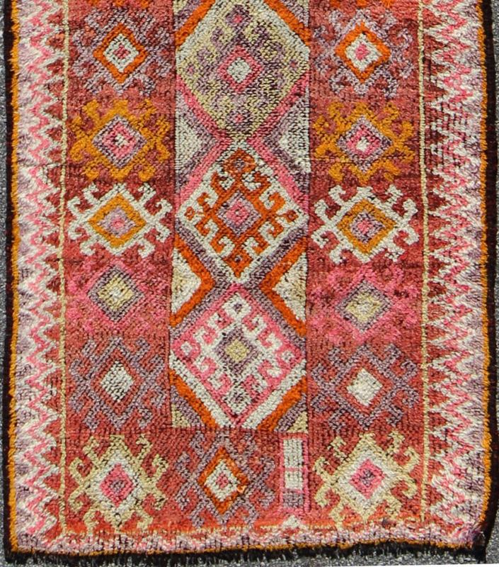 Tribal Turkish Runner with Colorful All - Over Diamond Design. Dimensions: 2'11 x 9'4. This geometric and tribal rug demonstrates an ostentatious side of modern design Turkish weaving. The various shades of red, softened by age, pair elegantly ... - Keivan Woven ArtsEN - 142235 - 8044Rug