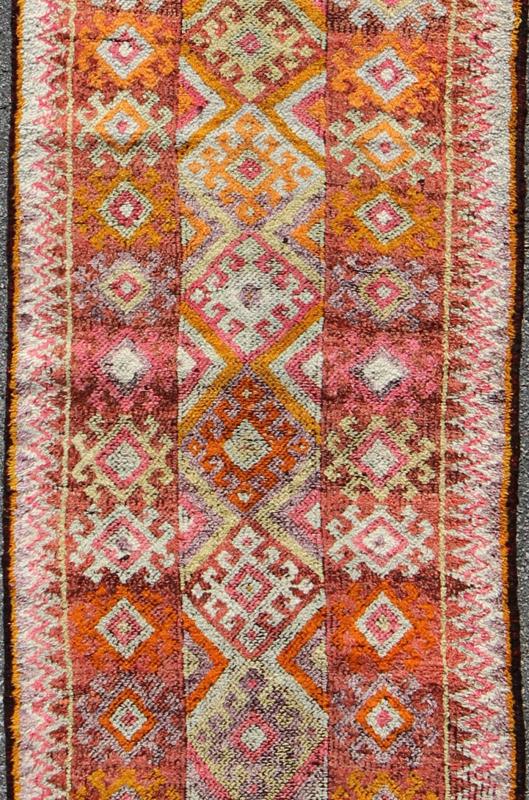 Tribal Turkish Runner with Colorful All - Over Diamond Design. Dimensions: 2'11 x 9'4. This geometric and tribal rug demonstrates an ostentatious side of modern design Turkish weaving. The various shades of red, softened by age, pair elegantly ... - Keivan Woven ArtsEN - 142235 - 8044Rug