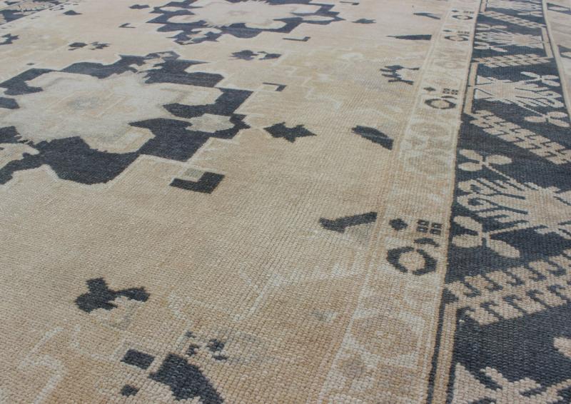 Vintage Hand Knotted Turkish Oushak With Medallion Design in Cream and Blue Handwoven in Turkey, this vintage Oushak rug features three large medallions in navy blue color. The repeating medallions are brought to life on a light cream background... - Keivan Woven ArtsEN - 142360 - 8048Rug