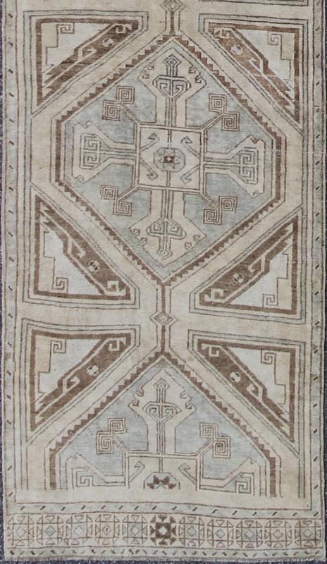 Vintage Turkish Oushak Runner with Ornate Cross Medallions Measures: 2'11'' x 13'3''. This compelling and unique Oushak runner was made in the mid - 20th century in Turkey. Characterized by a comely and highly representative Oushak composition,... - Keivan Woven ArtsEN - 142365 - 7851Rug
