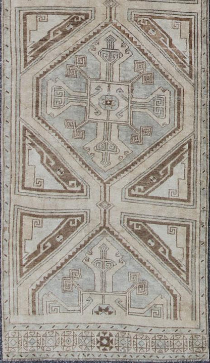 Vintage Turkish Oushak Runner with Ornate Cross Medallions Measures: 2'11'' x 13'3''. This compelling and unique Oushak runner was made in the mid - 20th century in Turkey. Characterized by a comely and highly representative Oushak composition,... - Keivan Woven ArtsEN - 142365 - 7851Rug