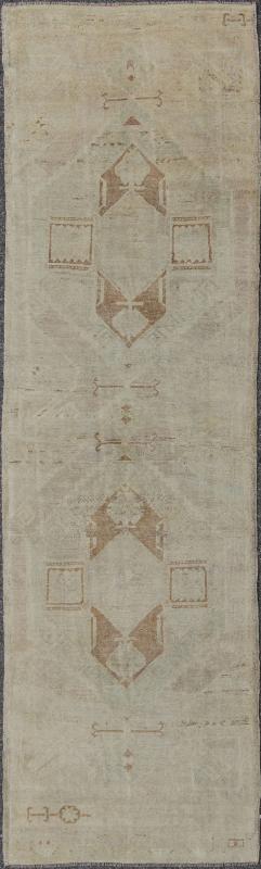 Vintage Oushak Turkish Runner with Ivory, Taupe and Light Brown and Faint Green Measures: 3'4'' x 11'8''. This beautiful vintage Oushak runner from mid - 20th century Turkey features a classic geometric Oushak design. The faint ivory groun... - Keivan Woven ArtsEN - 142367 - 8052Rug
