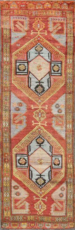Vintage Turkish Hand Knotted Oushak Long Gallery Rug With Two Tribal Medallions The various shades of red pair elegantly with the bold tones of light blue, yellow and charcoal, laid out over two large tribal medallions with motifs in the field.... - Keivan Woven ArtsEN - 142374 - 8062Rug