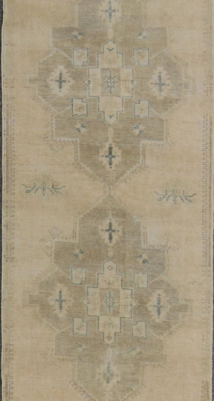 Vintage Turkish Oushak Runner in Neutral & Warm Colors with Tribal Medallions. Oushak Runner, vintage runner Measures: 3'8 x 11'1 This vintage Oushak carpet from mid - 20th century Turkey features a multi - medallion design in the central field... - Keivan Woven ArtsEN - 142391 - 8066Rug