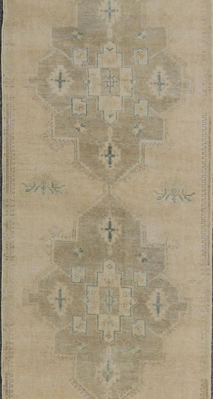 Vintage Turkish Oushak Runner in Neutral & Warm Colors with Tribal Medallions. Oushak Runner, vintage runner Measures: 3'8 x 11'1 This vintage Oushak carpet from mid - 20th century Turkey features a multi - medallion design in the central field... - Keivan Woven ArtsEN - 142391 - 8066Rug