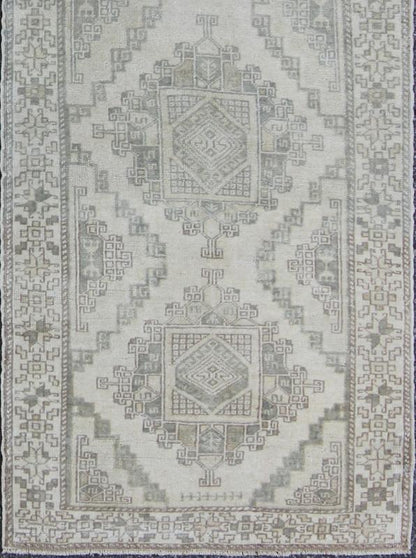 Vintage Oushak Runner with Central Medallions and Ornate Border Measures: 3'0'' x 12'3''. This beautiful vintage Oushak runner features a classic Oushak design, which is enhanced by lustrous wool. The faint ivory ground is home to six large a... - Keivan Woven ArtsEN - 142470 - 7855Rug