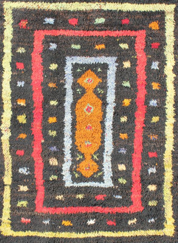 Vintage Turkish Tulu Rug with Tribal Pattern in Black, Yellow, Red, Blue and Red. Keivan Woven Arts / rug EN - 142568, country of origin / type: Turkey / Tulu, circa mid - 20th century Measures: 3'11 x 5'11. This vintage Tulu from mid - 20th century Tu... - Keivan Woven ArtsEN - 142568 - 7859Rug