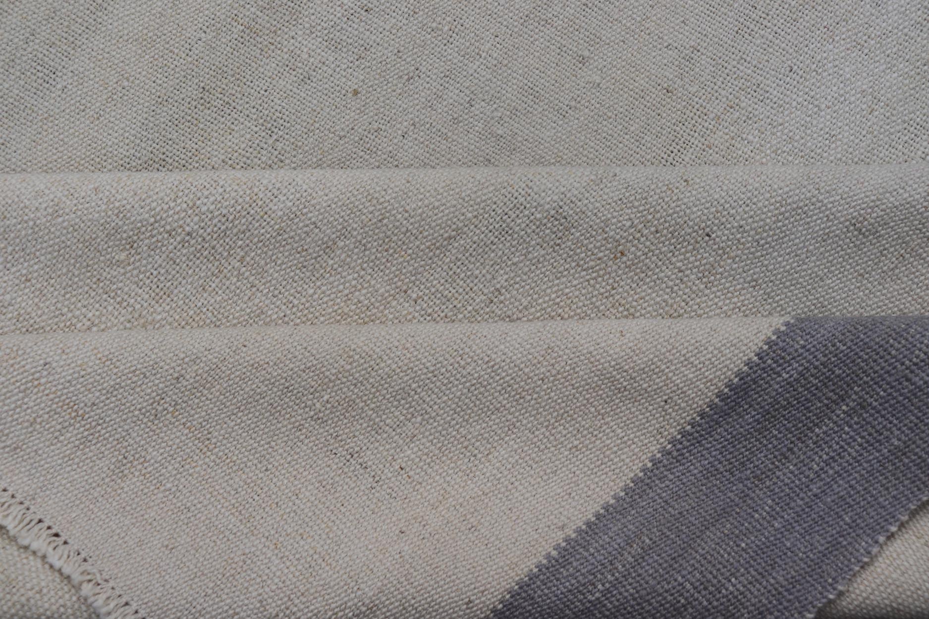 Vintage Turkish Kilim with Modern Design in Cream and Lavender Measures: 5'1 x 7'4 This piece, although vintage, is perfect for modern interiors, with minimalism on the high rise of today's trends. The face is plain, relying on the craf... - Keivan Woven ArtsEN - 142638 - 19130Rug