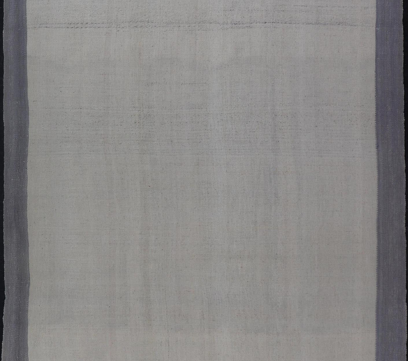 Vintage Turkish Kilim with Modern Design in Cream and Lavender Measures: 5'1 x 7'4 This piece, although vintage, is perfect for modern interiors, with minimalism on the high rise of today's trends. The face is plain, relying on the craf... - Keivan Woven ArtsEN - 142638 - 19130Rug