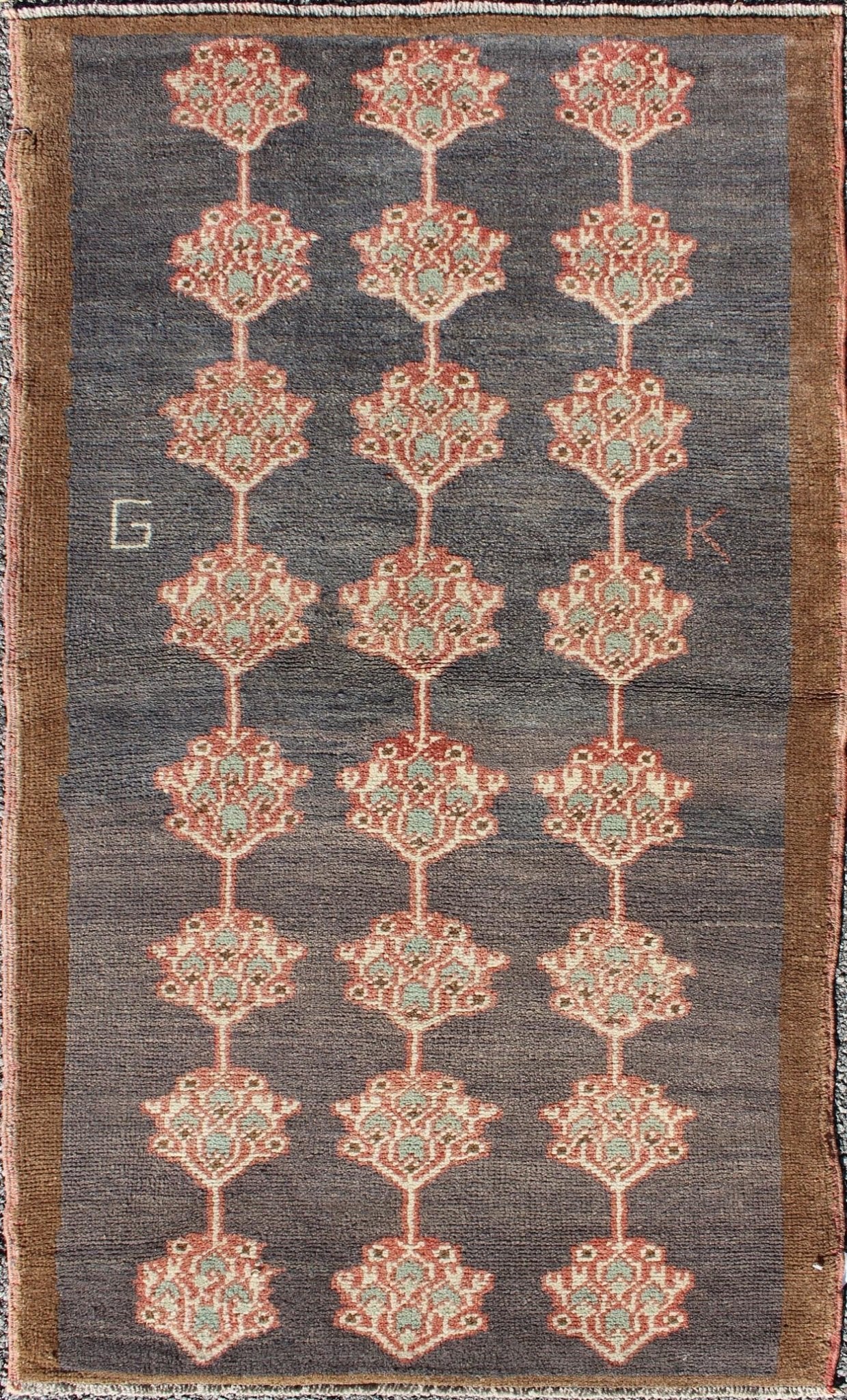 Vintage Turkish Tulu Carpet with Three Rows of Flowers on Gray & Charcoal Field' Turkish Tulu with three rows of Floral Medallions, rug EN - 142681, country of origin / type: Turkey / Tulu, circa mid - 20th Century. This Tulu carpet features thre... - Keivan Woven ArtsEN - 142681 - 8333Rug