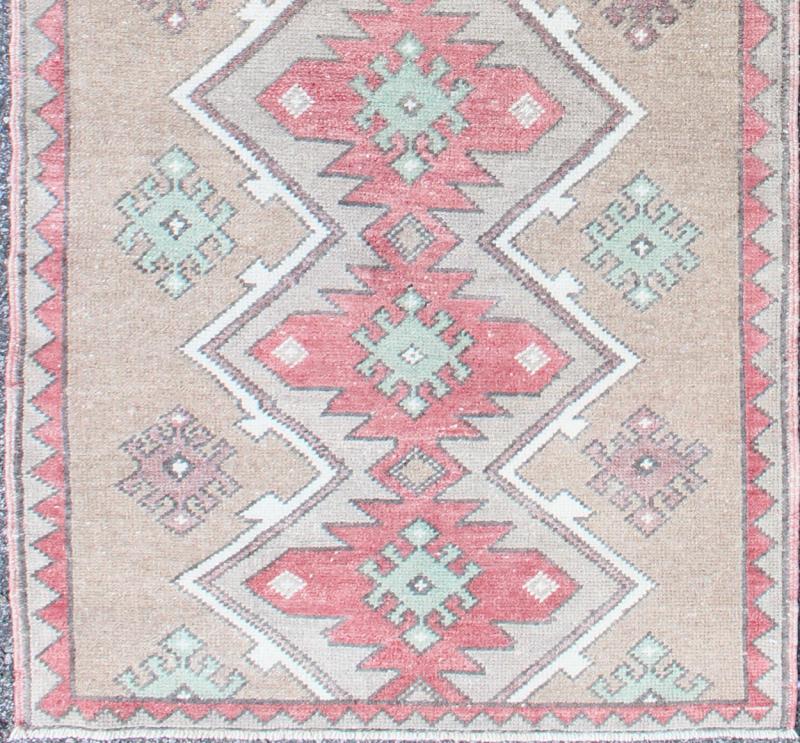 Turkish Tulu Runner With Geometric Medallions in Vivid Coral, Tan, and Mint Green. Rug EN - 142686. Keivan Woven Arts country of origin / type: Turkey / Tulu circa mid - 20th century. This Tulu runner contains seven red and light green medallions la... - Keivan Woven ArtsEN - 142686 - 8345Rug