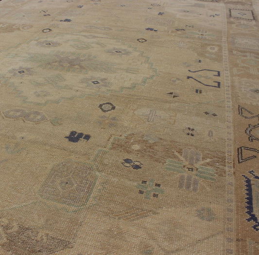 Vintage Turkish Oushak This stunning Turkish Oushak features an open, large - scale, geometric design on taupe and tan background with muted blues and a brown outlines. Measures: 5'6 x 9'3. - Keivan Woven ArtsEN - 142894 - 8074Rug