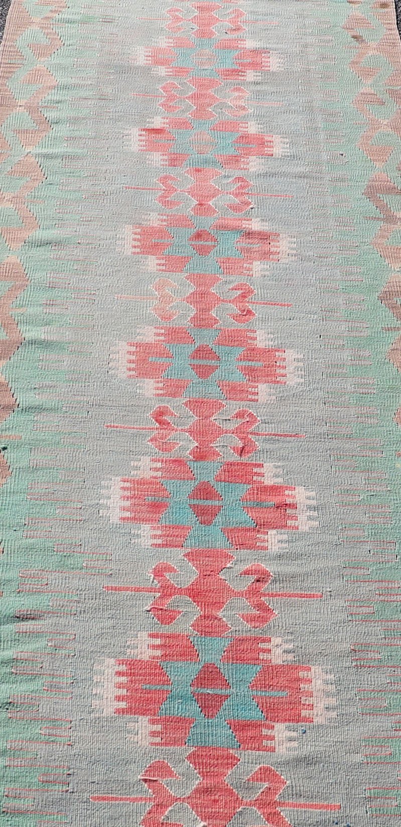 Measures: 2'11 x 11'8 Geometric Medallion Vintage Turkish Tribal Kilim Flat - Weave Runner. Keivan Woven Arts / rug EN - 14346, country of origin / type: Turkey / Kilim, circa 1950 This turkish kilim runner from Turkey features geometric medalli... - Keivan Woven ArtsEN - 14346 - 22590Rug