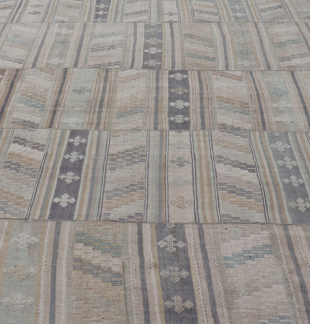 Measures: 9'5 x 16'6 Vintage Hand Woven Turkish Paneled Kilim Vintage Rug in Muted Colors. Keivan Woven Arts / rug EN - 14488 country of origin / type: Turkey / Kilim, circa mid - 20th century Hand Woven large vintage Turkish paneled in cream, b... - Keivan Woven ArtsEN - 14488 - 22776Rug