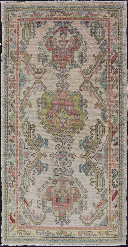 Measures: 2'10 x 5'8 Layered Medallion Vintage Turkish Area Rug Oushak with Geometric Motifs. Country of origin: Turkey; type: Oushak; design: Medallion; Keivan Woven Arts: rug EN - 14495; Layered medallion antique Turkish Oushak rug sub - geometric mo... - Keivan Woven ArtsEN - 14495 - 22782Rug