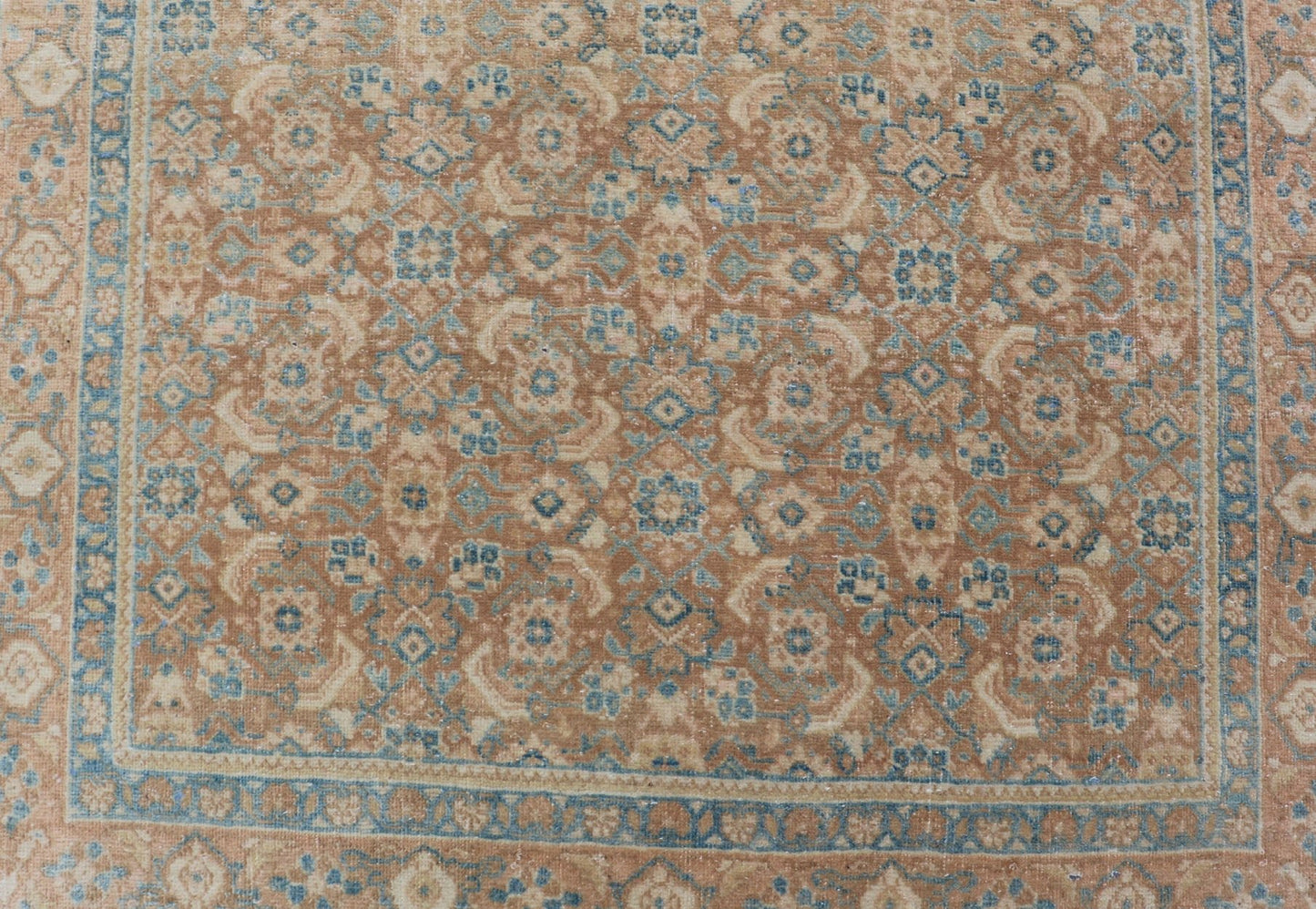 Measures: 3'4 x 11'0 Vintage Persian Tabriz Runner with All - Over Floral Design in Tan and Blue. Keivan Woven Arts / rug EN - 14502, country of origin/ type: Iran / Tabriz, circa 1950 This Persian runner with a sophisticated, all - over design fe... - Keivan Woven ArtsEN - 14502 - 23042Rug