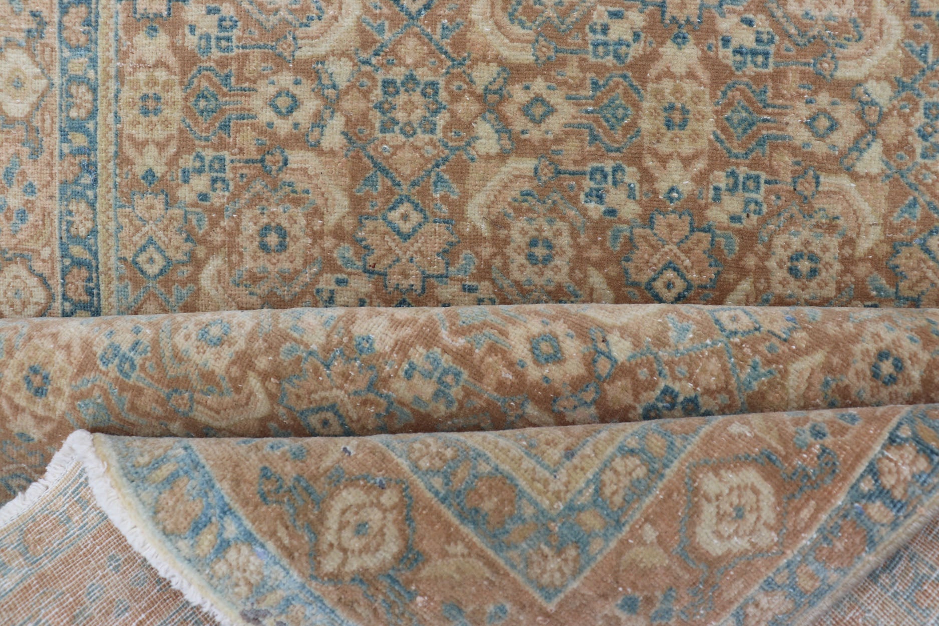 Measures: 3'4 x 11'0 Vintage Persian Tabriz Runner with All - Over Floral Design in Tan and Blue. Keivan Woven Arts / rug EN - 14502, country of origin/ type: Iran / Tabriz, circa 1950 This Persian runner with a sophisticated, all - over design fe... - Keivan Woven ArtsEN - 14502 - 23042Rug