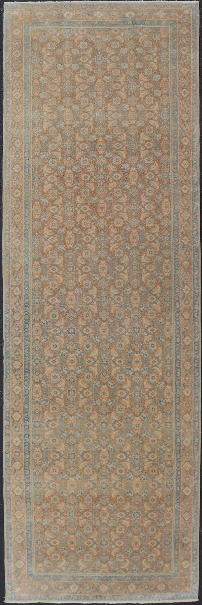 Measures: 3'4 x 11'0 Vintage Persian Tabriz Runner with All - Over Floral Design in Tan and Blue. Keivan Woven Arts / rug EN - 14502, country of origin/ type: Iran / Tabriz, circa 1950 This Persian runner with a sophisticated, all - over design fe... - Keivan Woven ArtsEN - 14502 - 23042Rug