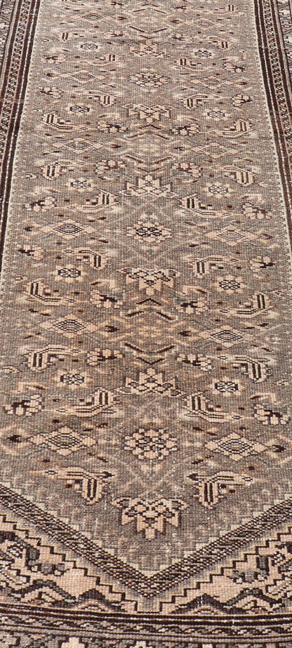 Measures: 2'11 x 9'4 Vintage Persian Hamadan Runner in Warm Tones of Grey, Brown and Taupe. Country of Origin: Iran; Type: Hamedan; Design: Floral, Persian Floral, All - Over; Keivan Woven Arts: rug EN - 14506. This vintage Persian runner featur... - Keivan Woven ArtsEN - 14506 - 18686Rug