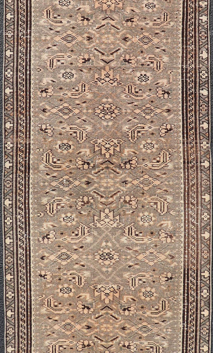 Measures: 2'11 x 9'4 Vintage Persian Hamadan Runner in Warm Tones of Grey, Brown and Taupe. Country of Origin: Iran; Type: Hamedan; Design: Floral, Persian Floral, All - Over; Keivan Woven Arts: rug EN - 14506. This vintage Persian runner featur... - Keivan Woven ArtsEN - 14506 - 18686Rug