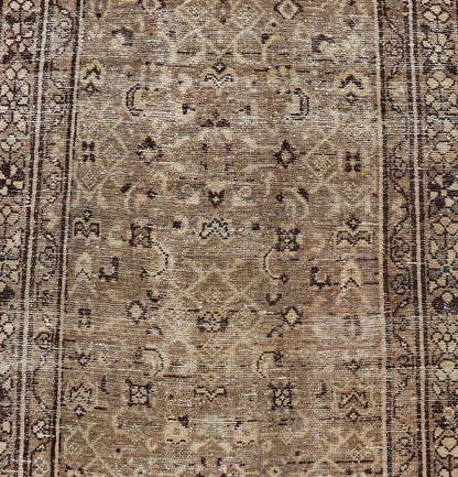 Measures: 3'0 x 9'2 Persian Hamadan Runner in Warm Tones of Tan, Taupe, Brown, and L. Brown. Country of Origin: Iran; Type: Hamedan; Design: Floral, Persian Floral, All - Over; Keivan Woven Arts: rug EN - 14507. This vintage Persian runner feat... - Keivan Woven ArtsEN - 14507 - 18692Rug