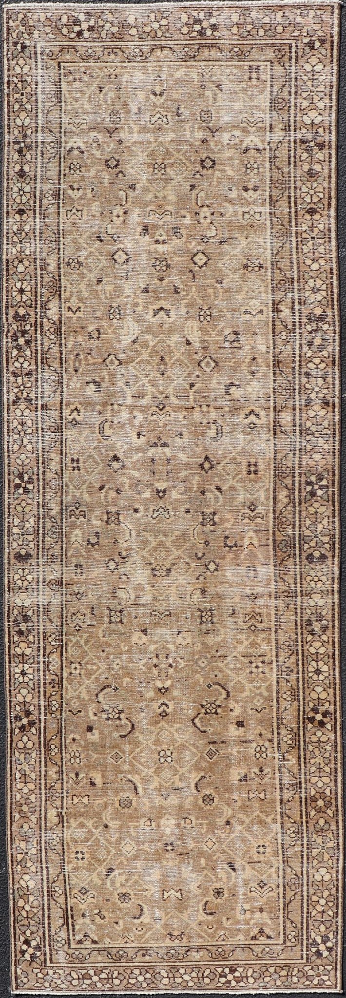 Measures: 3'0 x 9'2 Persian Hamadan Runner in Warm Tones of Tan, Taupe, Brown, and L. Brown. Country of Origin: Iran; Type: Hamedan; Design: Floral, Persian Floral, All - Over; Keivan Woven Arts: rug EN - 14507. This vintage Persian runner feat... - Keivan Woven ArtsEN - 14507 - 18692Rug
