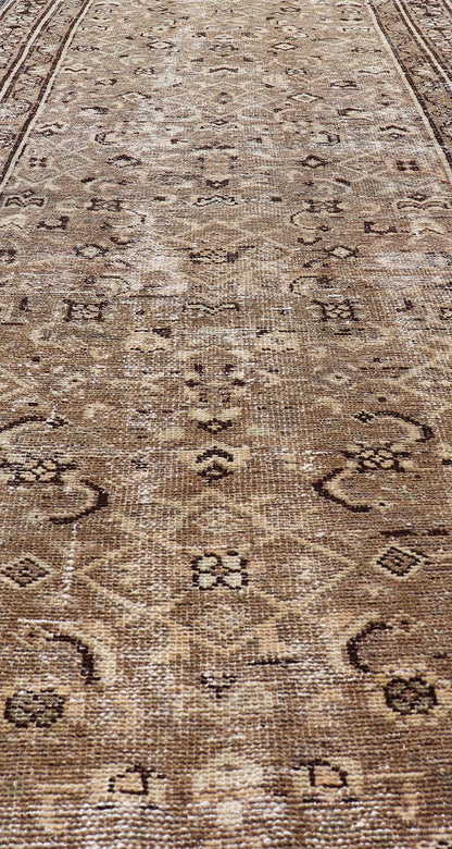 Measures: 3'0 x 9'2 Persian Hamadan Runner in Warm Tones of Tan, Taupe, Brown, and L. Brown. Country of Origin: Iran; Type: Hamedan; Design: Floral, Persian Floral, All - Over; Keivan Woven Arts: rug EN - 14507. This vintage Persian runner feat... - Keivan Woven ArtsEN - 14507 - 18692Rug