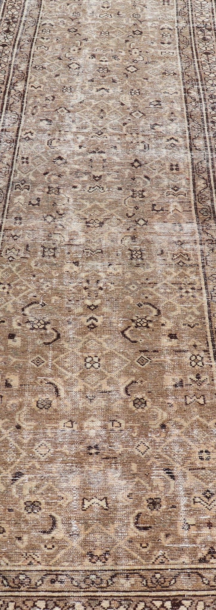 Measures: 3'0 x 9'2 Persian Hamadan Runner in Warm Tones of Tan, Taupe, Brown, and L. Brown. Country of Origin: Iran; Type: Hamedan; Design: Floral, Persian Floral, All - Over; Keivan Woven Arts: rug EN - 14507. This vintage Persian runner feat... - Keivan Woven ArtsEN - 14507 - 18692Rug