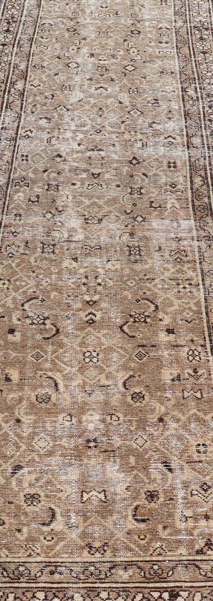 Measures: 3'0 x 9'2 Persian Hamadan Runner in Warm Tones of Tan, Taupe, Brown, and L. Brown. Country of Origin: Iran; Type: Hamedan; Design: Floral, Persian Floral, All - Over; Keivan Woven Arts: rug EN - 14507. This vintage Persian runner feat... - Keivan Woven ArtsEN - 14507 - 18692Rug