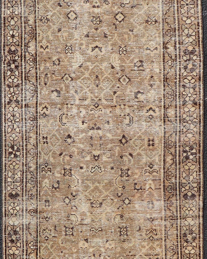 Measures: 3'0 x 9'2 Persian Hamadan Runner in Warm Tones of Tan, Taupe, Brown, and L. Brown. Country of Origin: Iran; Type: Hamedan; Design: Floral, Persian Floral, All - Over; Keivan Woven Arts: rug EN - 14507. This vintage Persian runner feat... - Keivan Woven ArtsEN - 14507 - 18692Rug