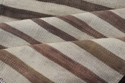 Measures: 3'0 x 11'1 Turkish Long Vintage Natural Kilim with Stripes in Ivory, Taupe and Brown. Keivan Woven Arts / rug EN - 14576, country of origin / type: Turkey / Kilim, circa Mid - 20th Century. This flat - woven Kilim runner from Turkey featu... - Keivan Woven ArtsEN - 14576 - 22794Rug
