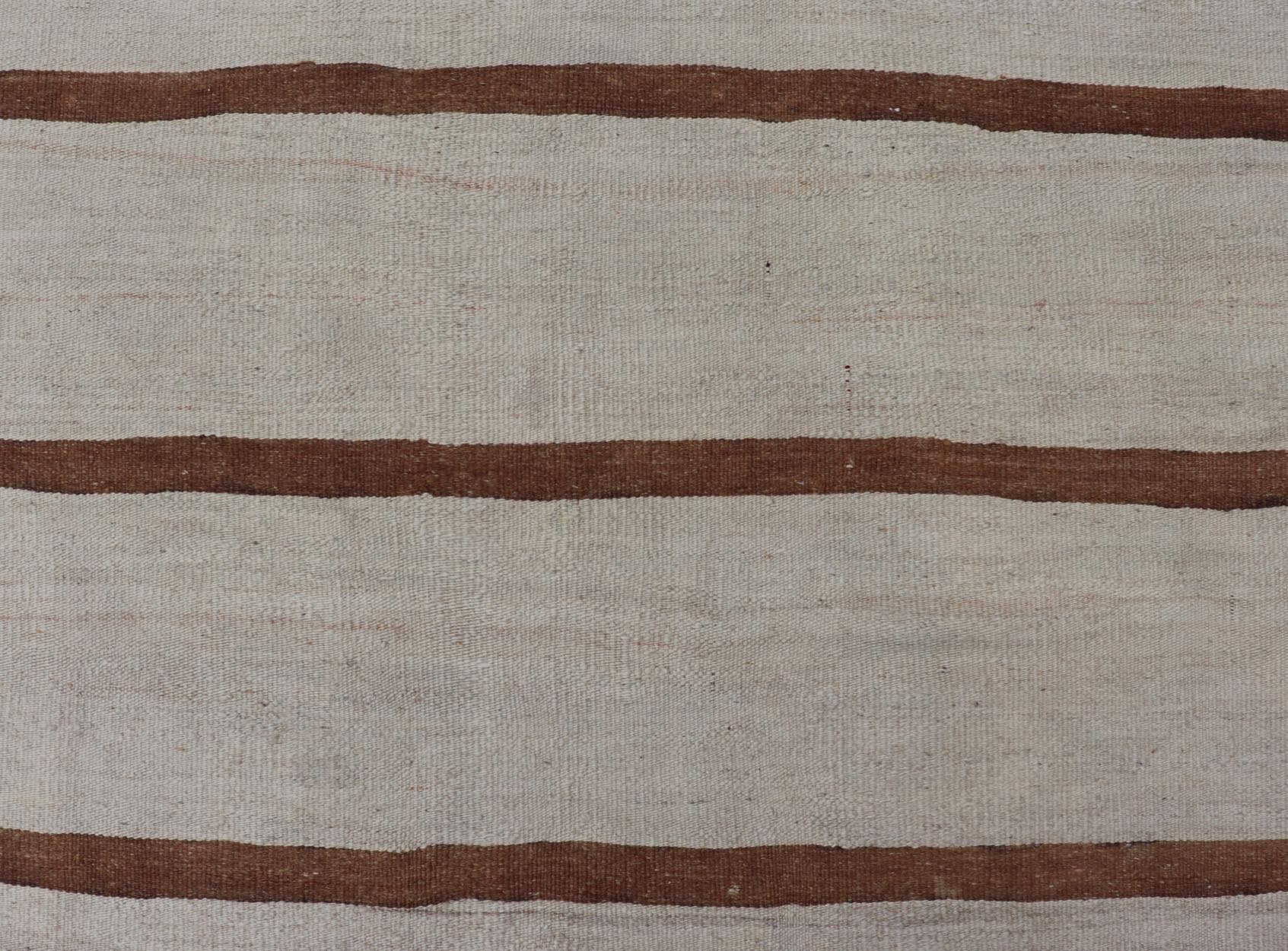 Vintage Turkish Flat - Weave Muted Colored Kilim in ivory, Brown and Light Tan. Minimalist design Kilim from Turkey, rug EN - 14585, country of origin / type: Turkey / Kilim, circa 1950 Measures: 4'8 x 7'8 This vintage flat - woven Kilim features ... - Keivan Woven ArtsEN - 14585 - 23965Rug