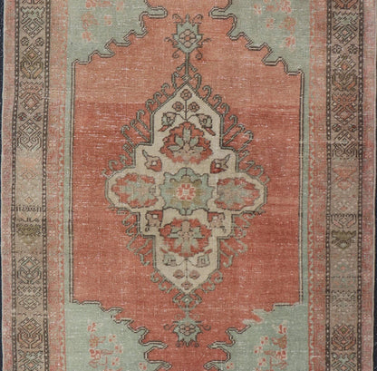Vintage Turkish Oushak Rug With Medallion in Earthy Color Tones With Coral Color. Keivan Woven Arts / rug EN - 14597, country of origin / type: Turkey / Oushak, circa 1940 Measures: 3'2 x 5'11 This vintage Oushak carpet from Turkey has center m... - Keivan Woven ArtsEN - 14597 - 23768Rug