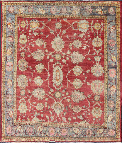 Antique Turkish Oushak rug in red background, gray border, yellow and green. This beautiful and traditional square sized antique oushak presents richly opulent colors and unusual design. Beautiful Turkish early 20th Century craftsmanship and inspiri... - Keivan Woven ArtsEN - 146 - 4359Rug