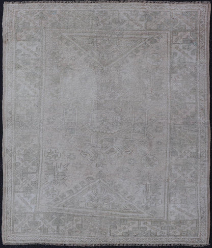 Vintage Geometric Oushak With Subtle Colors by Keivan Woven Arts Vintage Geometric Oushak with Subtle Colors by Keivan Woven Arts rug /EN - 14614 Measures: 4'6 x 5'6 This vintage Oushak rug features subtle geometric patterns and a me... - Keivan Woven ArtsEN - 14614 - 26382Rug