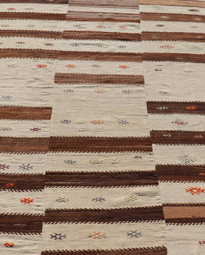 Measures: 6'0 x 7'10 Keivan Woven Arts Vintage Flat - Woven Turkish Paneled Kilim Rug in Wool with Stripe Design. Keivan Woven Arts; rug EN - 14691, country of origin / type: Turkey / Kilim, circa 1950. This flat - weave tribal Turkish kilim has b... - Keivan Woven ArtsEN - 14691 - 22968Rug