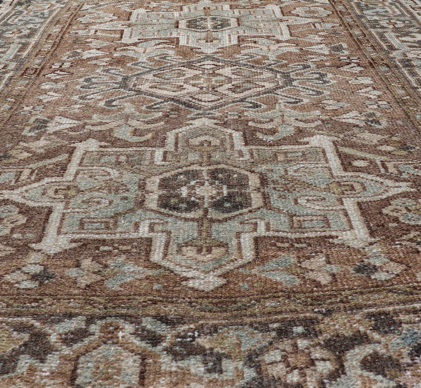 Measures: 3'8 x 4'6 Antique Persian Heriz Rug with Geometric Medallion Design in Mocha, Blue, & Tan. Keivan Woven Arts / rug EN - 14713, country of origin / type: Iran / Heriz, circa 1920 This antique Persian Heriz rug, from northwest Iran, di... - Keivan Woven ArtsEN - 14713 - 21841Rug