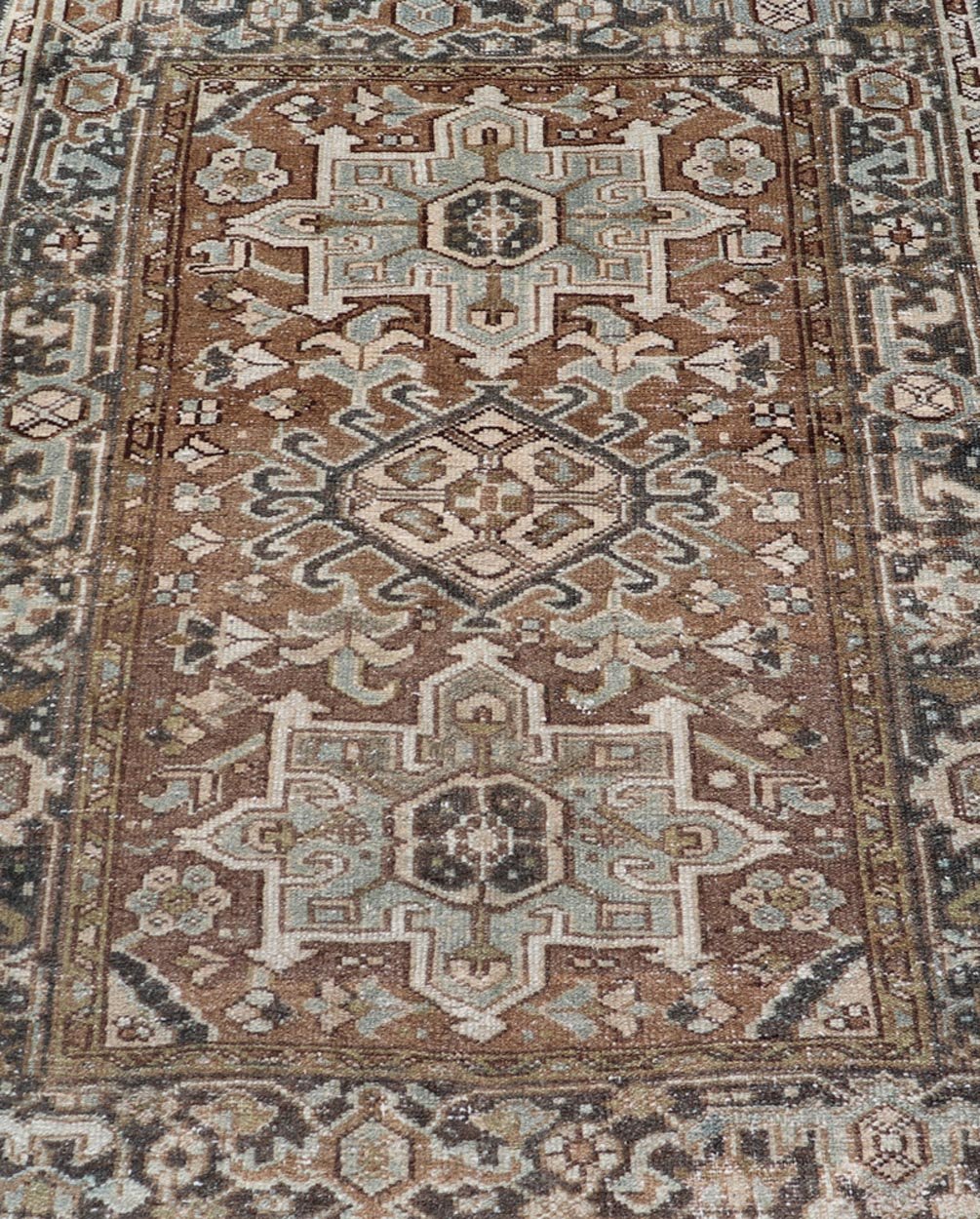 Measures: 3'8 x 4'6 Antique Persian Heriz Rug with Geometric Medallion Design in Mocha, Blue, & Tan. Keivan Woven Arts / rug EN - 14713, country of origin / type: Iran / Heriz, circa 1920 This antique Persian Heriz rug, from northwest Iran, di... - Keivan Woven ArtsEN - 14713 - 21841Rug