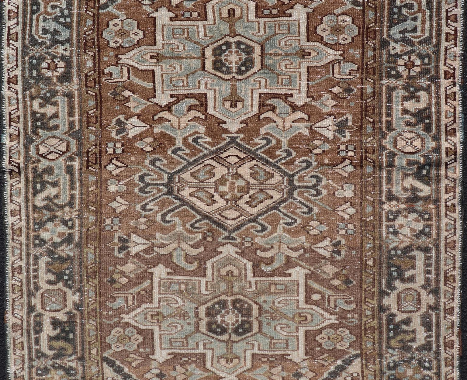 Measures: 3'8 x 4'6 Antique Persian Heriz Rug with Geometric Medallion Design in Mocha, Blue, & Tan. Keivan Woven Arts / rug EN - 14713, country of origin / type: Iran / Heriz, circa 1920 This antique Persian Heriz rug, from northwest Iran, di... - Keivan Woven ArtsEN - 14713 - 21841