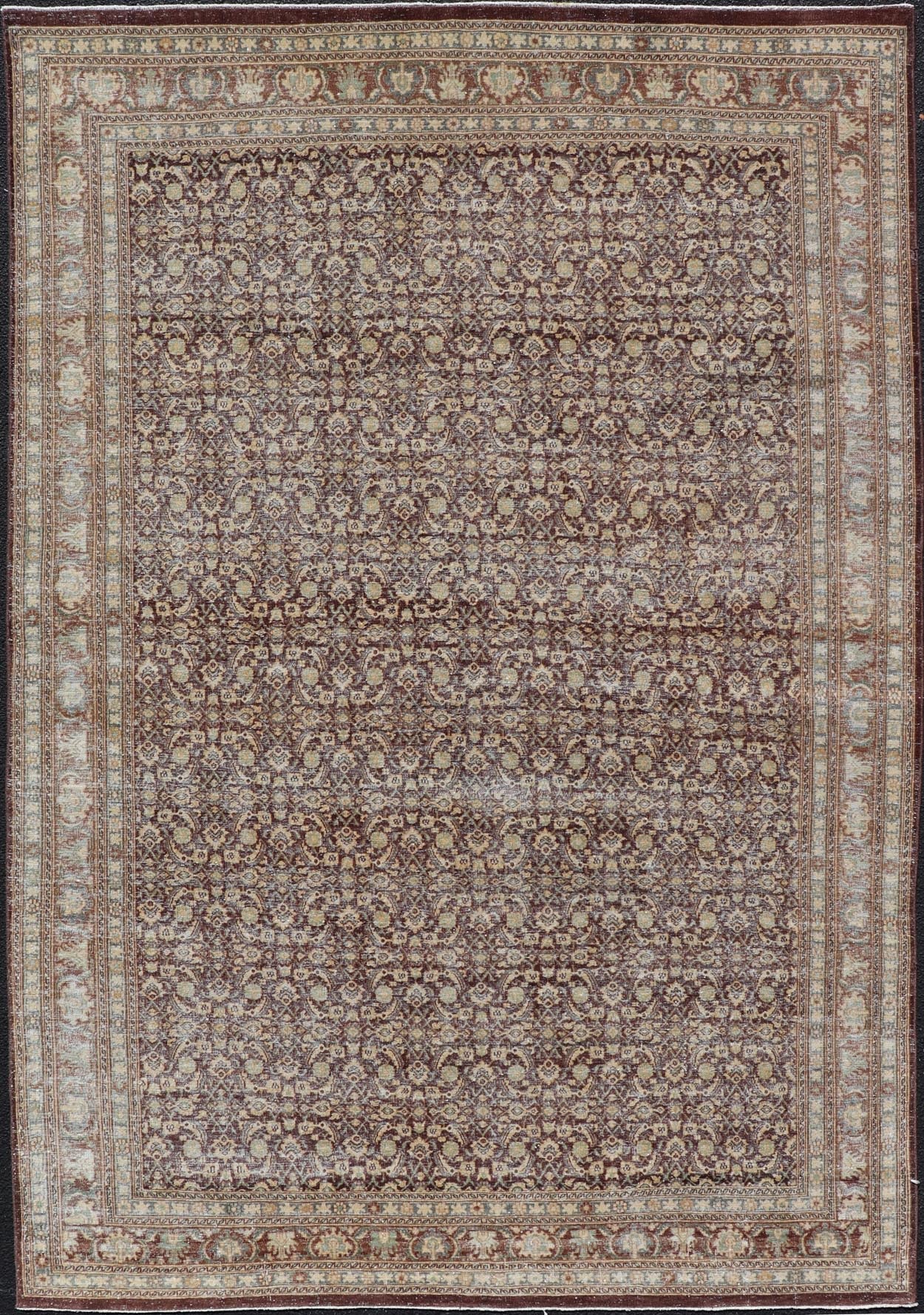 Measures: 6'4 x 9'10 Persian Tabriz Antique Rug in Herati Design In Dark Arginine, Blue, and Tan. Keivan Woven Arts / rug EN - 14794, country of origin / type: Iran / Tabriz, circa 1920. This beautiful early 20th century Persian Tabriz rug has... - Keivan Woven ArtsEN - 14794 - 21853Rug
