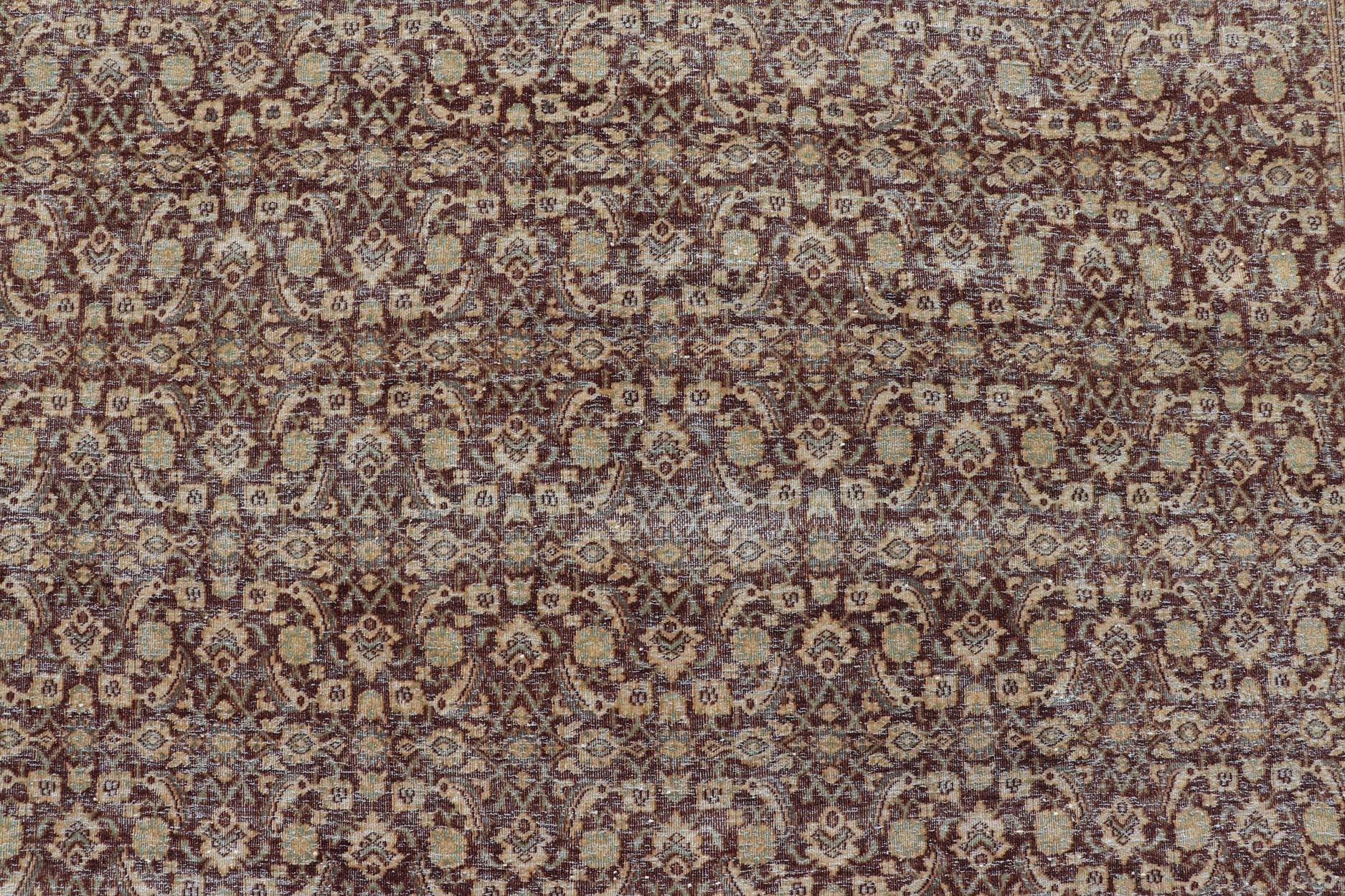 Measures: 6'4 x 9'10 Persian Tabriz Antique Rug in Herati Design In Dark Arginine, Blue, and Tan. Keivan Woven Arts / rug EN - 14794, country of origin / type: Iran / Tabriz, circa 1920. This beautiful early 20th century Persian Tabriz rug has... - Keivan Woven ArtsEN - 14794 - 21853Rug
