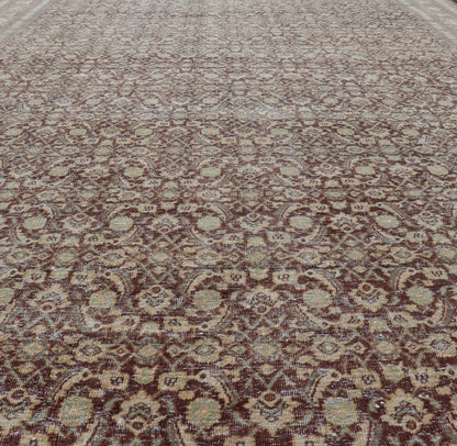 Measures: 6'4 x 9'10 Persian Tabriz Antique Rug in Herati Design In Dark Arginine, Blue, and Tan. Keivan Woven Arts / rug EN - 14794, country of origin / type: Iran / Tabriz, circa 1920. This beautiful early 20th century Persian Tabriz rug has... - Keivan Woven ArtsEN - 14794 - 21853