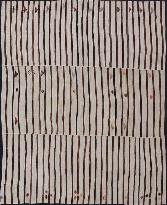 Measures: 14'8 x 18'6 This flat - weave tribal Turkish kilim has been hand - woven in wool. The rug features an all - over sub - geometric striped panel design, rendered in earthy tones; making this rug a superb fit for a wide variety of interiors. ... - Keivan Woven ArtsEN - 14854 - 22812