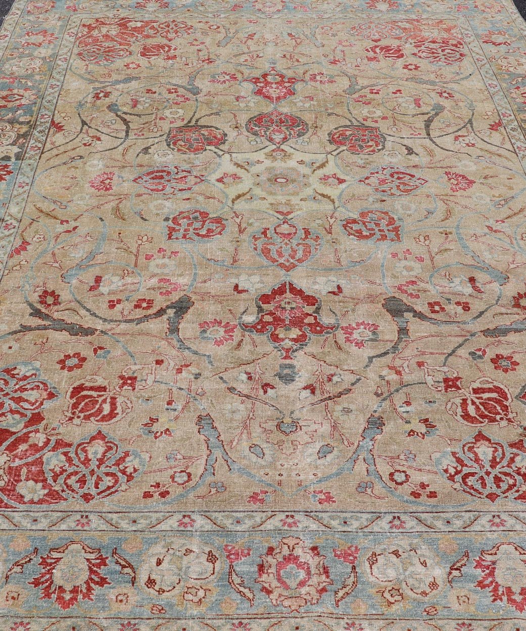 Antique Persian Tabriz Rug with Floral Medallion Design in Tan, Red, and Blue. Keivan Woven Arts / rug EN - 14861, country of origin / type: Iran / Tabriz, circa 1920 Floral Medallion Design in Tan, Red, and Blue. Measures: 8'4 x 11'9 This sublim... - Keivan Woven ArtsEN - 14861 - 23492Rug