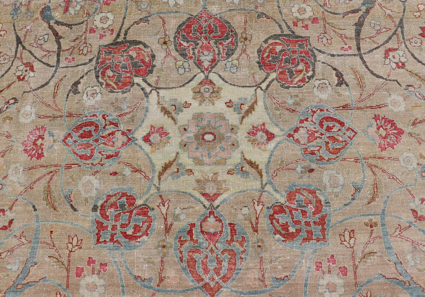 Antique Persian Tabriz Rug with Floral Medallion Design in Tan, Red, and Blue. Keivan Woven Arts / rug EN - 14861, country of origin / type: Iran / Tabriz, circa 1920 Floral Medallion Design in Tan, Red, and Blue. Measures: 8'4 x 11'9 This sublim... - Keivan Woven ArtsEN - 14861 - 23492Rug