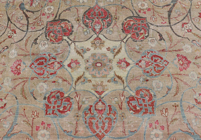 Antique Persian Tabriz Rug with Floral Medallion Design in Tan, Red, and Blue. Keivan Woven Arts / rug EN - 14861, country of origin / type: Iran / Tabriz, circa 1920 Floral Medallion Design in Tan, Red, and Blue. Measures: 8'4 x 11'9 This sublim... - Keivan Woven ArtsEN - 14861 - 23492Rug