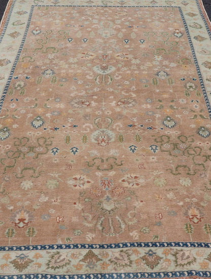Colorful Turkish Oushak Rug in Salmon Background with All - Over Floral Design. Country of Origin: Turkey; Type: Oushak; Design: All - Over, Floral; Keivan Woven Arts/ rug EN - 14950; Measures: 6'7 x 10'7 Beautiful 1930's colorful Turkish Oush... - Keivan Woven ArtsEN - 14950 - 23666Rug